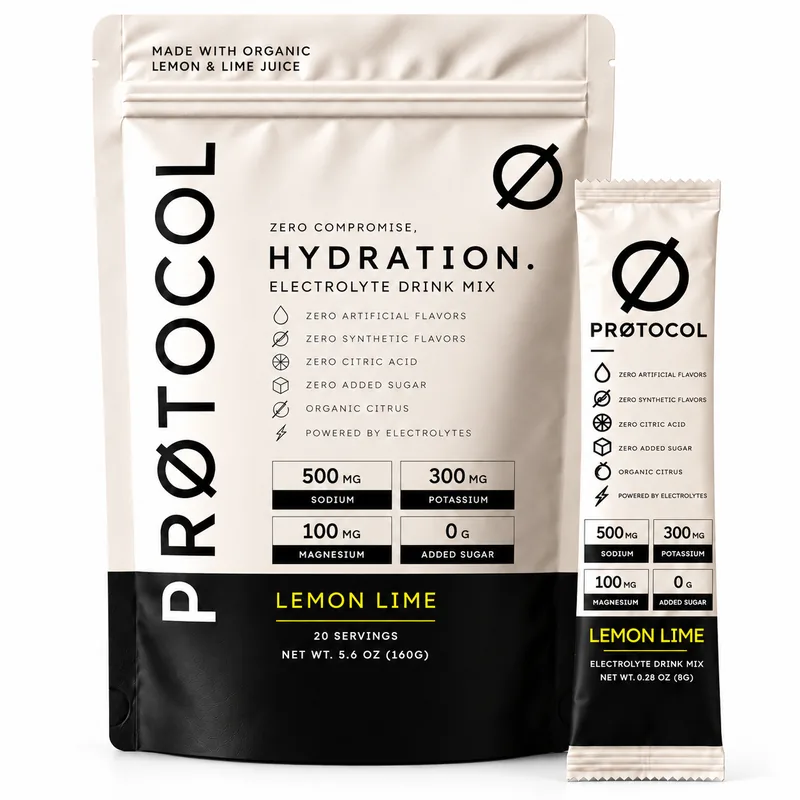 PRØTOCOL Hydration Lemon Lime 20-serving bag and a single stick pack on a white background